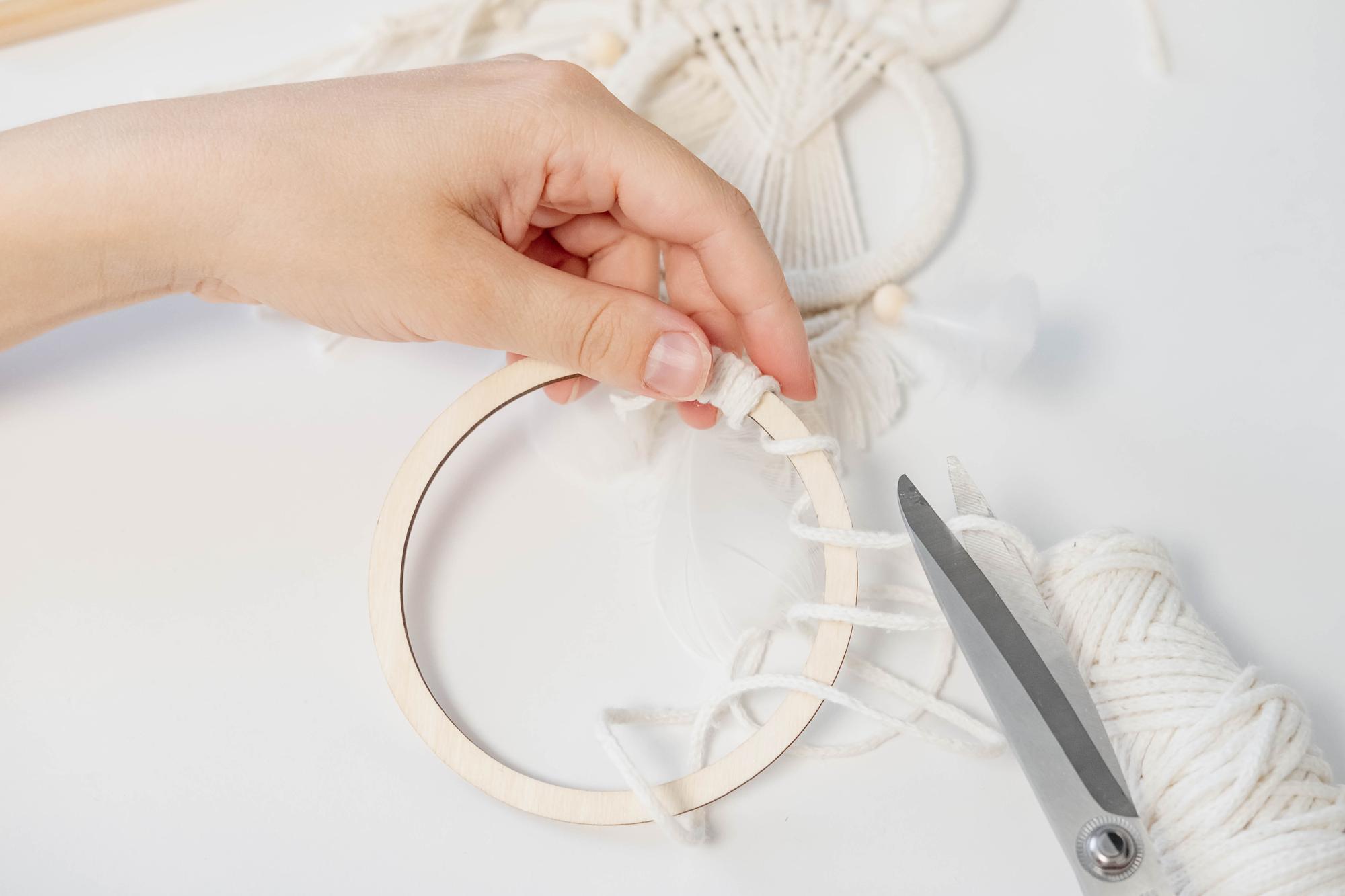 Studio hands preparing hoop